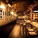 A traditional tavern with tile floors and a wooden bar
